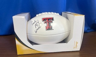 Texas Tech football signed by Coach Joey McGuire