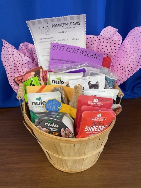 Variety of cat and dog food/ treats, 4lb of dog food, $100 gift certificate towards grooming services
