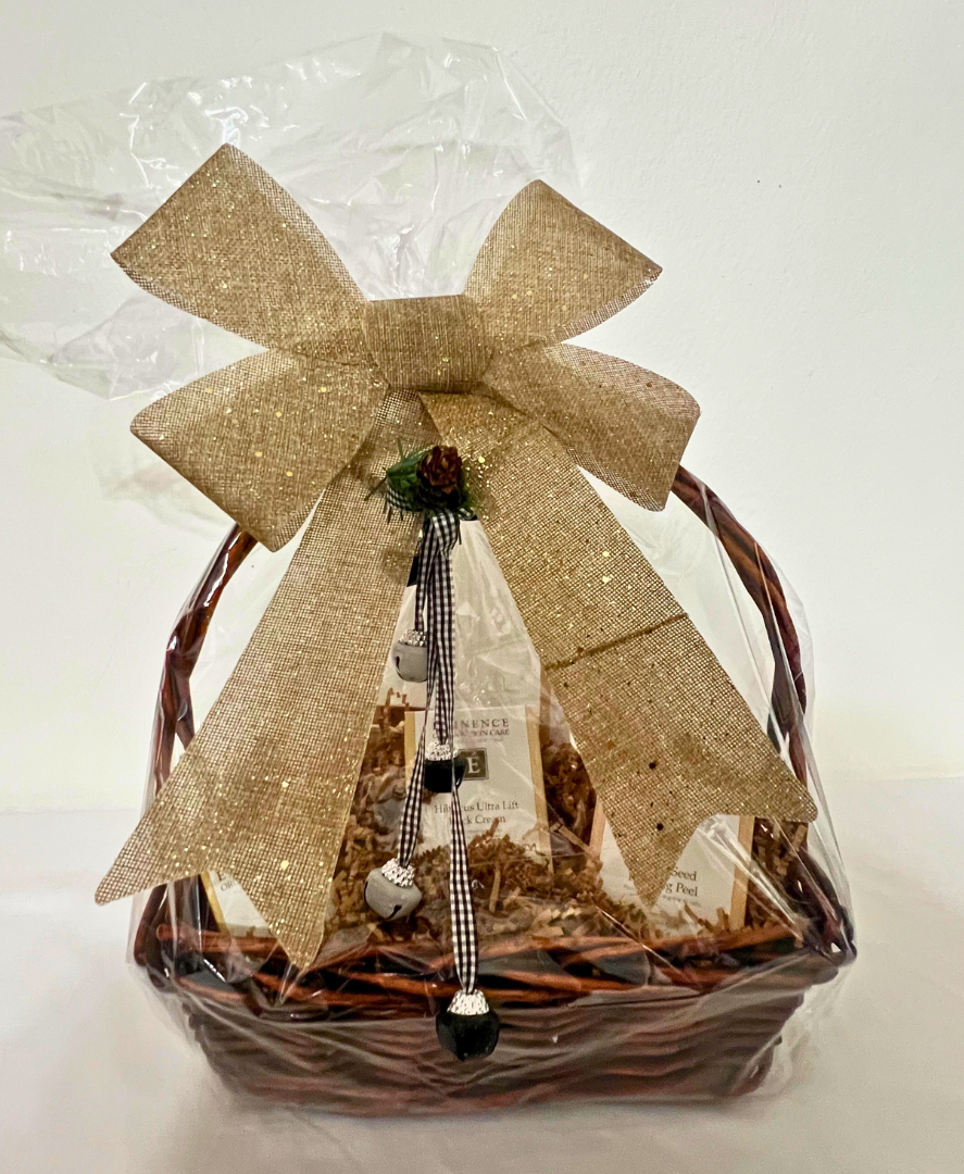 Basket with Eminence Skin Care Products: Citrus Lip Balm, Eye cream, Neck Cream,  Refining Peel.